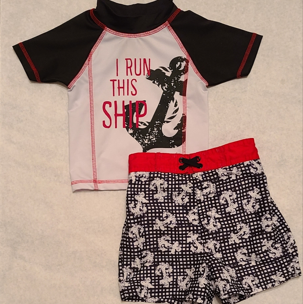 Short sleeved rashguard swim top with matching swim trunks